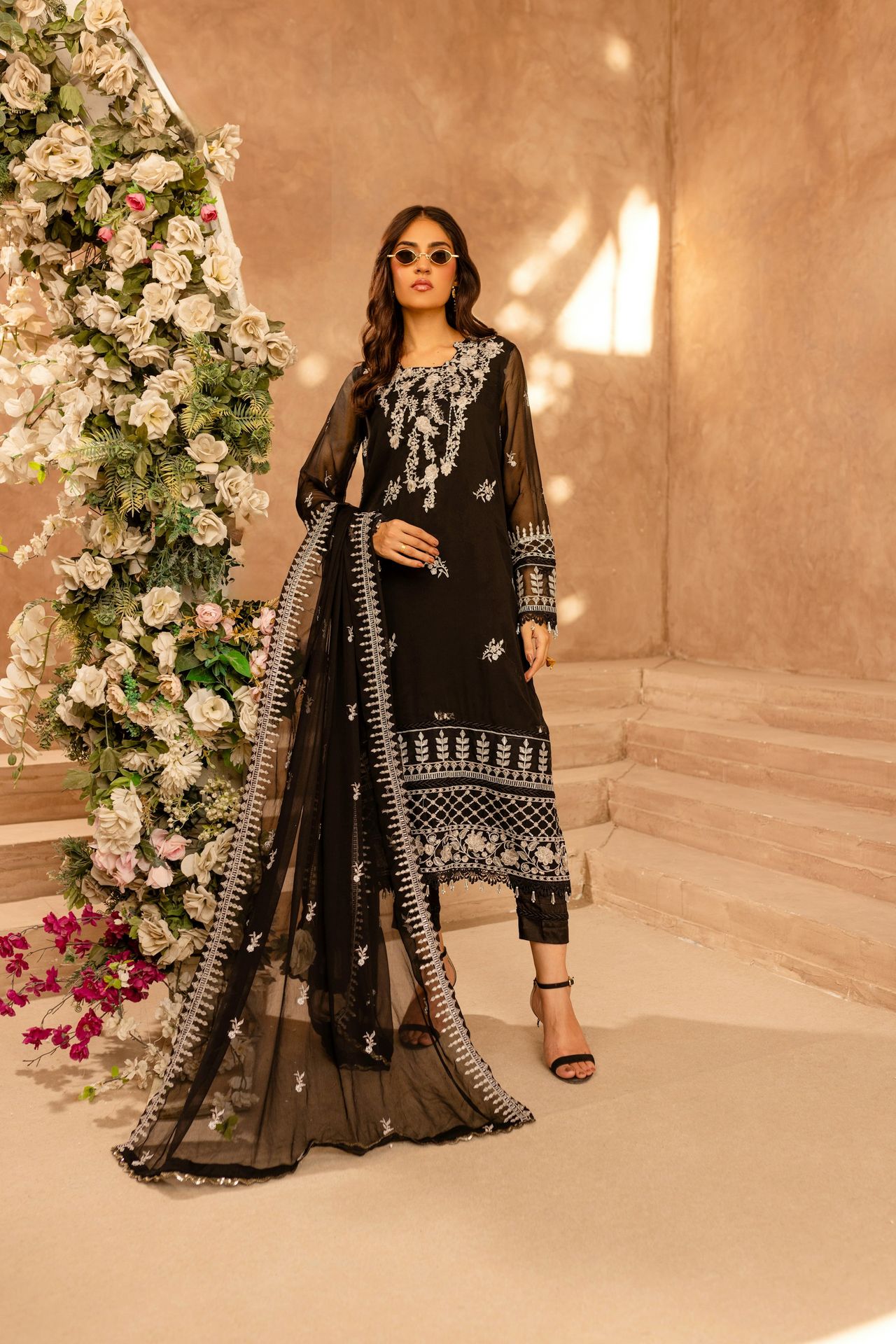 A woman in a black and white outfit